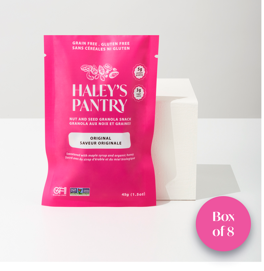 Pink package of Haley's Pantry nut and seed granola mini snack on a white background