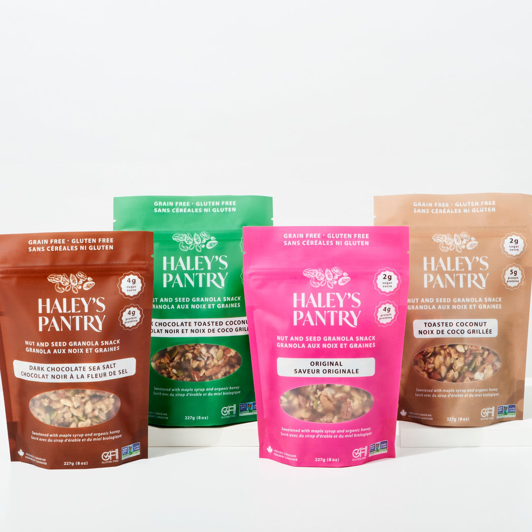 Four packages of Haley's Pantry granola snacks on a white background